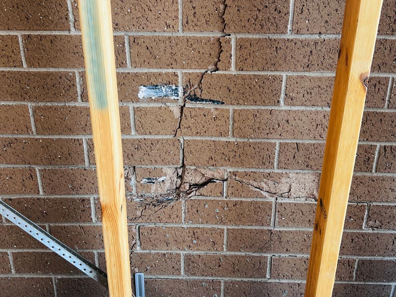 Cracked wall, compromising safety and integrity of home