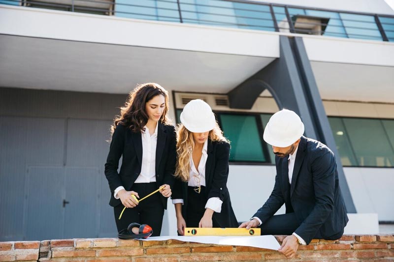A team of building consultants ion Melbourne working on construction site